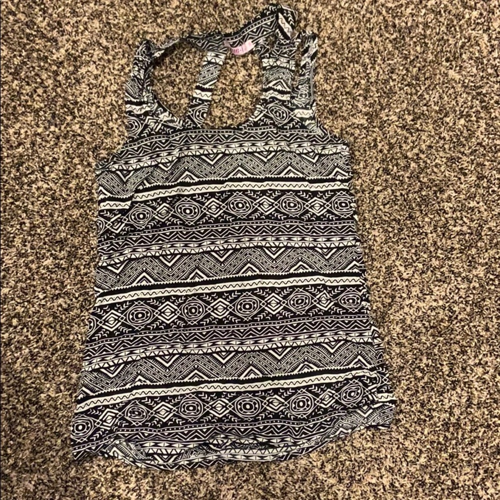 Shirt says size 38 but fits like a med